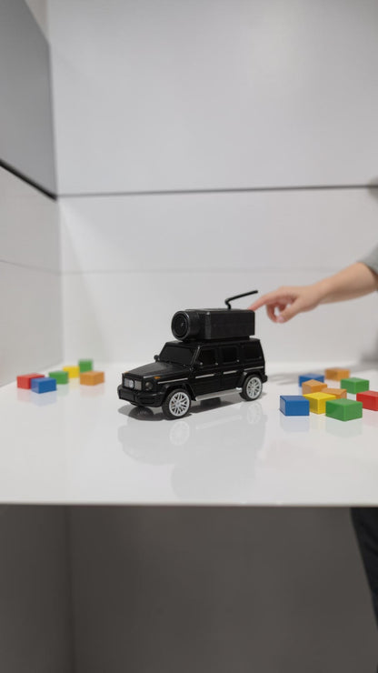 Mini coche RC negro Castor UP con cámara FPV montada en el techo, ideal para exploración en interiores